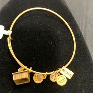 NWT Alex and Ani gold toned Monopoly bracelet